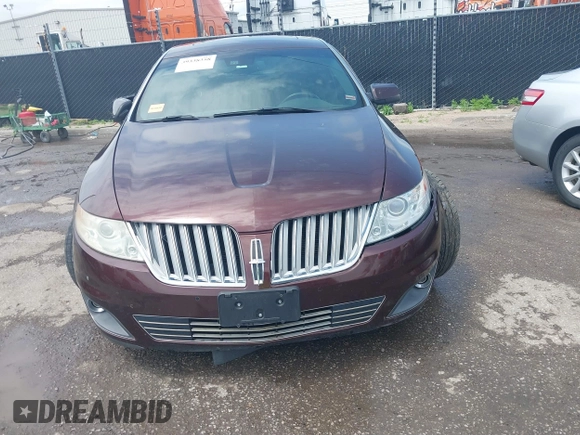 2009 Lincoln MKS with VIN 1LNHM93R69G628697, listed as a IAAI auction lot 39338358 with 125,585 mi miles and . Bid and sale history available at DreamBid. Image 13.