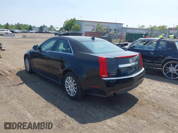 2012 Cadillac CTS z VIN 1G6DC5E52C0142318, wystawiony jako IAAI lot #42413205 z przebiegiem 100 694 mil mil oraz . Historia ofert i sprzedaży dostępna na DreamBid. Obrazek 3.