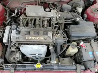 1993 Toyota Corolla with VIN JT2AE09E5P0029582, listed as a Copart auction lot 83427734 with 244,450 mi miles and Salvage title. Bid and sale history available at DreamBid. Image 13.