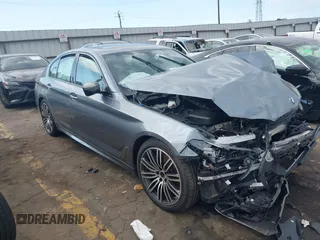 2018 BMW 5 Series M550i xDrive with VIN WBAJB9C53JB286035, listed as a IAAI auction lot 40590380 with 57,072 mi miles. Bid and sale history available at carsss.com. Image 1.