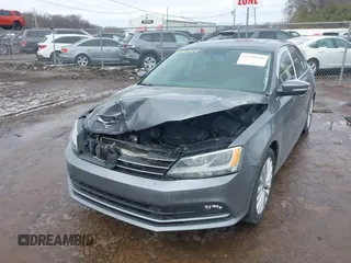2015 Volkswagen Jetta Sedan 1.8T SE w/Connectivity with VIN 3VWD07AJ8FM260537, listed as a IAAI auction lot 41730338 with 155,724 mi miles. Bid and sale history available at carsss.com. Image 17.