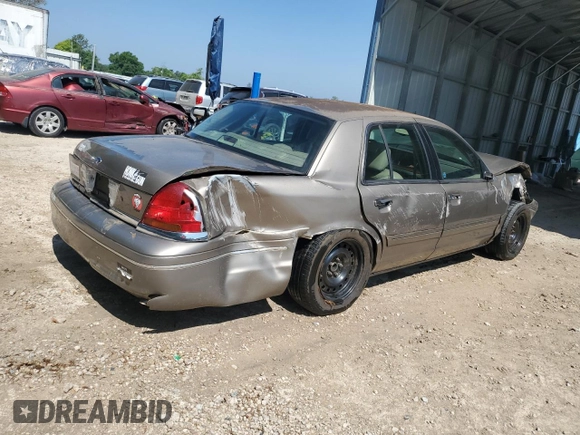 2003 Ford Crown Victoria LX z VIN 2FAFP74W33X141881, wystawiony jako Copart lot #54204695 z przebiegiem 98 466 mil mil oraz Szkoda całkowita • Salvage title. Historia ofert i sprzedaży dostępna na DreamBid. Obrazek 3.