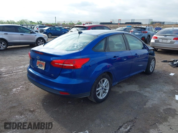 2018 Ford Focus SE z VIN 1FADP3F2XJL293337, wystawiony jako IAAI lot #42121294 z przebiegiem 71 241 mil mil oraz . Historia ofert i sprzedaży dostępna na DreamBid. Obrazek 4.