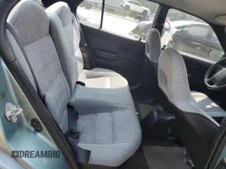 1994 Toyota Tercel DX z VIN JT2EL43T3R0489039, wystawiony jako Copart lot #67834034 z przebiegiem 139 726 mil mil oraz Szkody całkowita. Historia ofert i sprzedaży dostępna na DreamBid. Obrazek 10.
