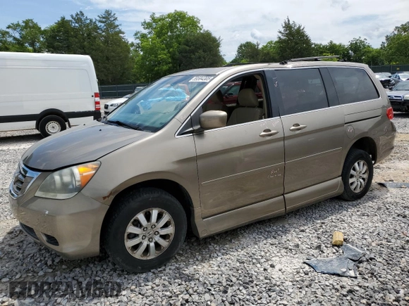 2010 Honda Odyssey EX z VIN 5FNRL3H47AB005755, wystawiony jako Copart lot #59584305 z przebiegiem 90 338 mil mil oraz Szkoda całkowita • Salvage title. Historia ofert i sprzedaży dostępna na DreamBid. Obrazek 1.