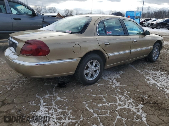 1999 Lincoln Continental with VIN 1LNHM97V2XY644250, listed as a Copart auction lot 82440454 with 196,568 mi miles and Clean Title. Bid and sale history available at carsss.com. Image 3.