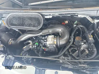 2023 Ford Transit Cargo with VIN 1FTBR1X86PKC09421, listed as a IAAI auction lot 42843981 with 10,233 mi miles and . Bid and sale history available at DreamBid. Image 8.