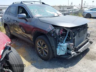 2023 Toyota RAV4 Hybrid XLE Premium with VIN 4T3B6RFV9PU117919, listed as a IAAI auction lot 42528322 with 27,236 mi miles and . Bid and sale history available at DreamBid. Image 1.