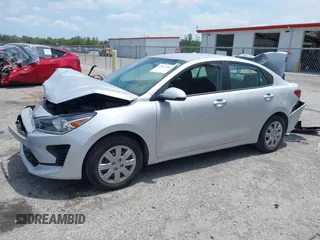 2023 Kia Rio S z VIN 3KPA24AD4PE604207, wystawiony jako IAAI lot #42077201 z przebiegiem 16 559 mil mil oraz . Historia ofert i sprzedaży dostępna na DreamBid. Obrazek 17.
