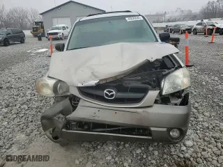 2003 Mazda Tribute LX with VIN 4F2YZ94113KM55268, listed as a Copart auction lot 45026945 with 244,366 mi miles and Salvage Title. Bid and sale history available at carsss.com. Image 12.