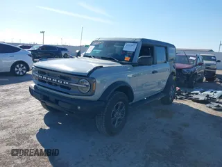 2022 Ford Bronco with VIN 1FMEE5BP1NLB60162, listed as a IAAI auction lot 41213977 with 21,226 mi miles. Bid and sale history available at carsss.com. Image 2.