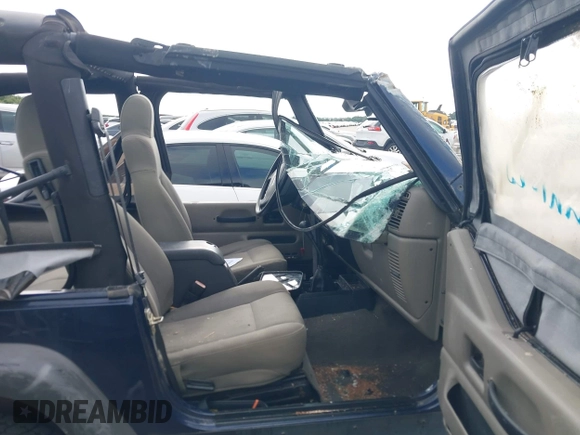 2006 Jeep Wrangler SE with VIN 1J4FA29156P739521, listed as a IAAI auction lot 42563566 with 117,281 mi miles and . Bid and sale history available at DreamBid. Image 5.