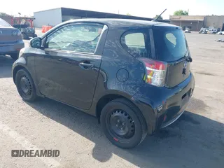 2013 Scion iQ with VIN JTNJJXB04DJ024322, listed as a IAAI auction lot 42618525 with 154,559 mi miles and . Bid and sale history available at DreamBid. Image 3.