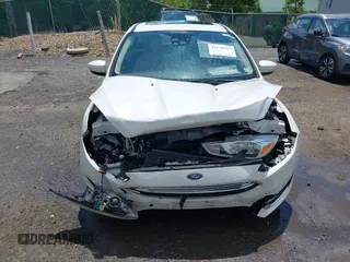 2016 Ford Focus Titanium with VIN 1FADP3N21GL309340, listed as a IAAI auction lot 42518653 with 101,555 mi miles and . Bid and sale history available at DreamBid. Image 12.