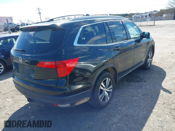 2016 Honda Pilot EX-L with VIN 5FNYF5H57GB023852, listed as a IAAI auction lot 41811412 with 151,707 mi miles and . Bid and sale history available at DreamBid. Image 4.