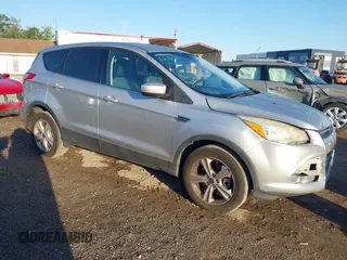 2015 Ford Escape SE with VIN 1FMCU0G95FUA44739, listed as a IAAI auction lot 42030903 with 182,826 mi miles. Bid and sale history available at carsss.com. Image 1.