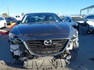 2014 Mazda 3 S Grand Touring with VIN JM1BM1W36E1112033, listed as a IAAI auction lot 41412655 with 115,050 mi miles and . Bid and sale history available at DreamBid. Image 12.