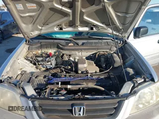 1999 Honda CR-V LX with VIN JHLRD284XXC019021, listed as a IAAI auction lot 41031098 with 204,206 mi miles. Bid and sale history available at carsss.com. Image 10.