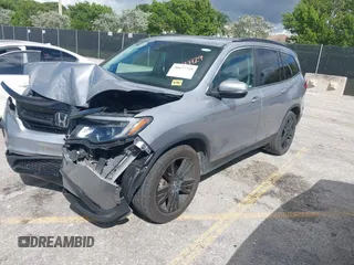 2022 Honda Pilot Special Edition with VIN 5FNYF5H21NB012512, listed as a IAAI auction lot 40677729 with 202,674 mi miles and . Bid and sale history available at carsss.com. Image 17.