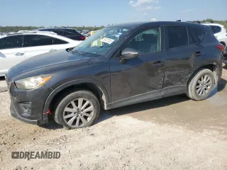 2016 Mazda CX-5 Touring z VIN JM3KE2CY1G0641005, wystawiony jako Copart lot #50427305 z przebiegiem 154 599 mil mil oraz Czysty tytuł • Clean title. Historia ofert i sprzedaży dostępna na DreamBid. Obrazek 1.