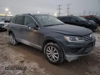 2016 Volkswagen Touareg Sport with VIN WVGEF9BP2GD005296, listed as a Copart auction lot 88808735 with 133,429 mi miles and Salvage Title. Bid and sale history available at DreamBid. Image 4.
