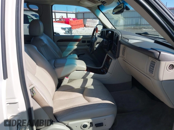 2005 Cadillac Escalade z VIN 1GYEC63N65R243624, wystawiony jako IAAI lot #42161106 z przebiegiem 150 877 mil mil oraz . Historia ofert i sprzedaży dostępna na DreamBid. Obrazek 5.