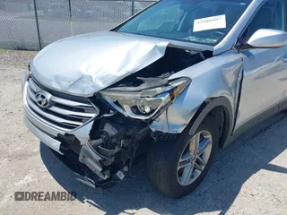 2017 Hyundai Santa Fe 2.4L with VIN 5XYZU3LB7HG407524, listed as a IAAI auction lot 42580597 with 117,311 mi miles and . Bid and sale history available at DreamBid. Image 6.