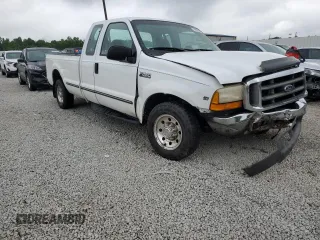 1999 Ford F-250 XL with VIN 1FTNX20S1XEB68189, listed as a Copart auction lot 60920605 with 209,822 mi miles and Salvage title. Bid and sale history available at DreamBid. Image 4.