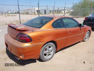 2003 Pontiac Grand Am z VIN 1G2NV12E23C308025, wystawiony jako IAAI lot #42458294 z przebiegiem 205 349 mil mil oraz . Historia ofert i sprzedaży dostępna na DreamBid. Obrazek 4.