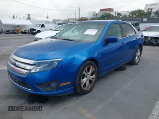 2012 Ford Fusion SE with VIN 3FAHP0HA9CR351141, listed as a IAAI auction lot 42140427 with 219,049 mi miles. Bid and sale history available at carsss.com. Image 2.