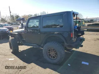 2009 Jeep Wrangler Rubicon with VIN 1J4GA64169L765933, listed as a Copart auction lot 84963104 with 107,190 mi miles and Salvage Title. Bid and sale history available at DreamBid. Image 2.