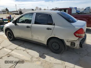 2010 Nissan Versa 1.6 with VIN 3N1CC1AP4AL372566, listed as a Copart auction lot 84704534 with 333,475 mi miles and Salvage Title. Bid and sale history available at carsss.com. Image 2.