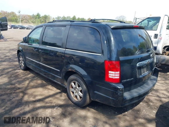 2010 Chrysler Town & Country Touring with VIN 2A4RR5D12AR359509, listed as a IAAI auction lot 42178261 with 160,707 mi miles and . Bid and sale history available at DreamBid. Image 3.
