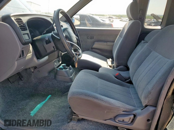 1999 Nissan Frontier XE with VIN 1N6DD26S9XC307893, listed as a Copart auction lot 66045605 with 239,269 mi miles and Salvage title. Bid and sale history available at DreamBid. Image 7.
