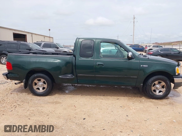 2001 Ford F-150 XL with VIN 1FTZX07271KB88709, listed as a IAAI auction lot 42599181 with 153,985 mi miles and . Bid and sale history available at DreamBid. Image 13.