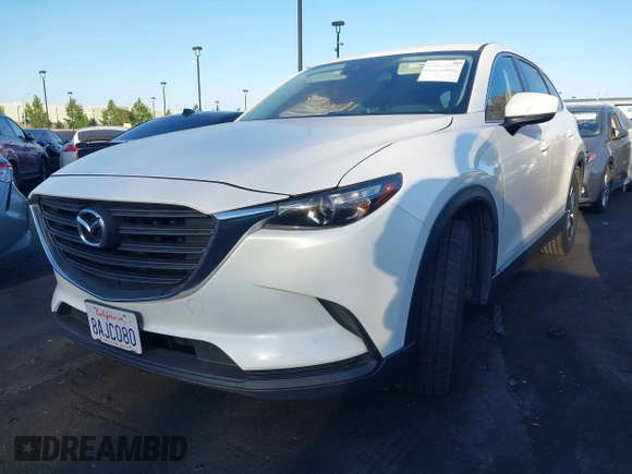 2018 Mazda CX-9 Sport with VIN JM3TCABY8J0204499, listed as a IAAI auction lot 42374933 with 114,408 mi miles and . Bid and sale history available at DreamBid. Image 17.