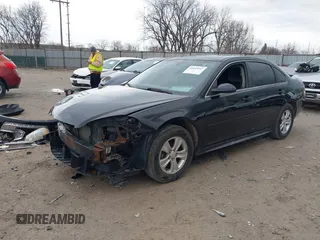 2014 Chevrolet Impala LS with VIN 2G1WA5E39E1136977, listed as a IAAI auction lot 41843947 with 122,709 mi miles and . Bid and sale history available at DreamBid. Image 2.
