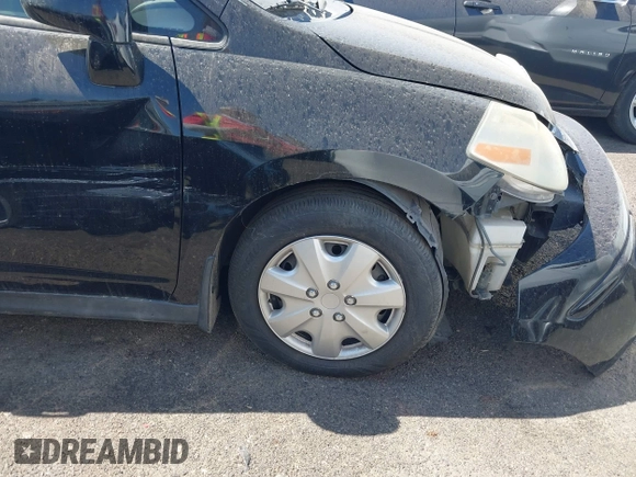 2009 Nissan Versa S with VIN 3N1BC11E19L440957, listed as a IAAI auction lot 40039437 with Not Provided miles and . Bid and sale history available at DreamBid. Image 13.