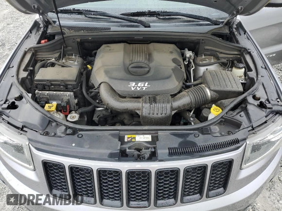 2014 Jeep Grand Cherokee Laredo with VIN 1C4RJEAG2EC179547, listed as a Copart auction lot 53328055 with 107,451 mi miles and Salvage Title. Bid and sale history available at DreamBid. Image 12.
