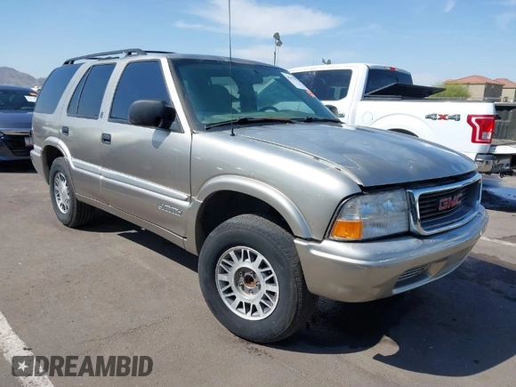 1999 GMC Jimmy SLE with VIN 1GKDT13W5X2539067, listed as a IAAI auction lot 41979222 with 1 mi miles. Bid and sale history available at carsss.com. Image 1.