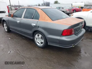 2003 Mitsubishi Galant ES with VIN 4A3AA46G83E136877, listed as a IAAI auction lot 41469411 with 307,492 mi miles. Bid and sale history available at carsss.com. Image 3.