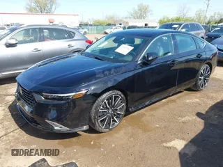 2023 Honda Accord Touring with VIN 1HGCY2F88PA040055, listed as a IAAI auction lot 42092946 with 32,930 mi miles and . Bid and sale history available at DreamBid. Image 2.
