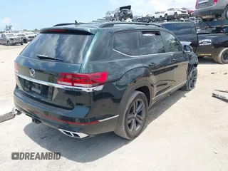 2021 Volkswagen Atlas SE z VIN 1V2PR2CA7MC510191, wystawiony jako IAAI lot #42235942 z przebiegiem 108 597 mil mil oraz . Historia ofert i sprzedaży dostępna na DreamBid. Obrazek 4.