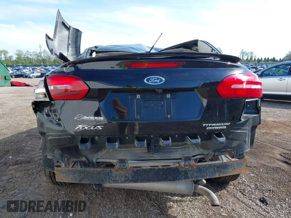 2016 Ford Focus Titanium with VIN 1FADP3J22GL242818, listed as a IAAI auction lot 42177015 with Not provided miles and . Bid and sale history available at DreamBid. Image 16.