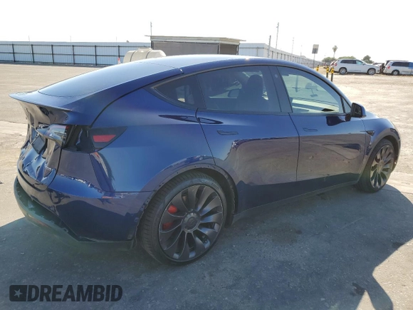 2021 Tesla Model Y Performance with VIN 5YJYGDEF0MF262336, listed as a Copart auction lot 60618534 with 29,242 mi miles and Salvage Title. Bid and sale history available at DreamBid. Image 3.