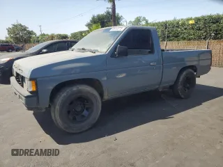 1990 Nissan Frontier with VIN 1N6SD11S9LC321876, listed as a Copart auction lot 59913575 with 119,909 mi miles and Salvage title. Bid and sale history available at DreamBid. Image 1.
