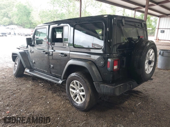 2023 Jeep Wrangler Willys with VIN 1C4HJXDG0PW617101, listed as a IAAI auction lot 42111687 with 56,415 mi miles and . Bid and sale history available at DreamBid. Image 3.