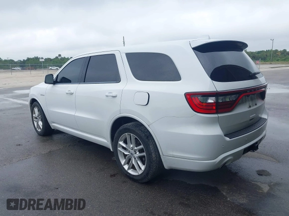 2021 Dodge Durango R/T with VIN 1C4SDHCT3MC572704, listed as a IAAI auction lot 41989456 with 71,260 mi miles and . Bid and sale history available at DreamBid. Image 3.
