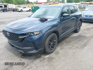 2023 Mazda CX-50 S Preferred Plus z VIN 7MMVABCM4PN119583, wystawiony jako IAAI lot #42108949 z przebiegiem 26 254 mil mil oraz . Historia ofert i sprzedaży dostępna na DreamBid. Obrazek 2.