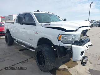 2020 Ram 2500 Big Horn with VIN 3C6UR5DL1LG115089, listed as a IAAI auction lot 41236581 with 90,797 mi miles. Bid and sale history available at carsss.com. Image 1.